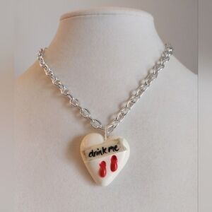 Polymer clay vampire "drink me" heart necklace